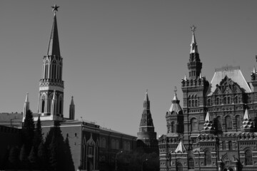 Black and white photography. View of the Nikolskaya Tower of the Moscow Kremlin and the building of the Historical Museum.