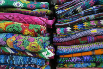 Handmade woven multicolor textiles with indigenous pattern in a souvenir bazar  
