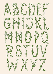 Decorative alphabet made of green tree branches