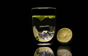 delicious and refreshing lemonade on black background