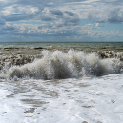 sea waves splashing on a hot summer  beach