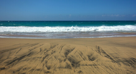 Fototapeta na wymiar sand beach and waves