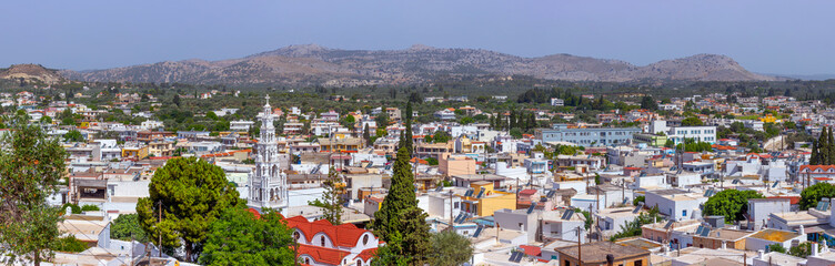 A exciting panoramic cityscape view of Archangelos at Rhodes, Greece. Sunny hot weather in mid-July.