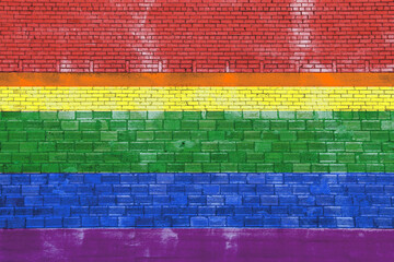 symbolic rainbow painted brick stone wall yellow red green blue purple gay rights pride flag colors social symbol mural © DrewDuzz