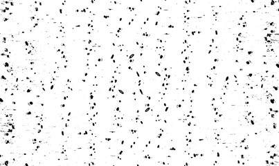 Small uneven spots and particles of debris. Abstract vector texture. Distressed uneven background. Grunge texture overlay with fine grains isolated on white background. Vector illustration. EPS10.