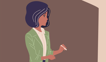 The teacher near the blackboard holds a chalk in his hands. Vector flat colored.