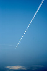 Blue sky with white line of flying get on the beach