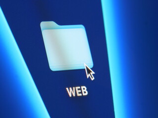 Web - macro shot of folder on computer desktop with mouse pointer - zooming in on screen pixels