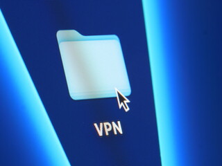 VPN - macro shot of folder on computer desktop with mouse pointer - zooming in on screen pixels