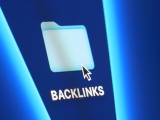 Backlinks - macro shot of folder on computer desktop with mouse pointer - zooming in on screen pixels