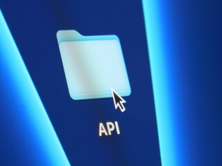 API - macro shot of folder on computer desktop with mouse pointer - zooming in on screen pixels