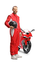 Motorbike racer holding a helmet and smiling with a red bike