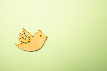 birds carved from wood on different backgrounds