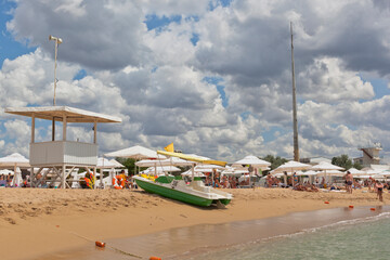 Catamaran rental on the beach of the Evolution sports center in the village of Zaozernoye, Evpatoria, Crimea