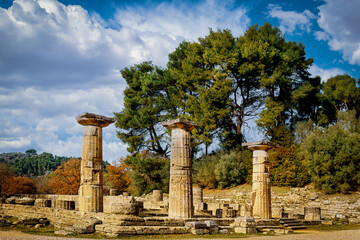 Ancient Olympia - reconstructed sandstone columns and foundation of ruins from classical Greece