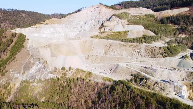 Aerial view of a huge surface mining area at a mountain in Austria