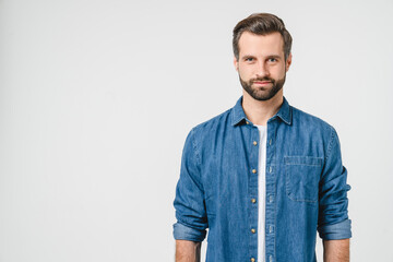 Closeup portrait of handsome caucasian young man boyfriend in denim casual clothes looking at...