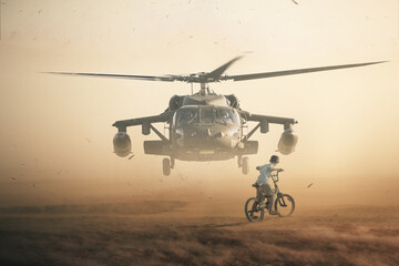 Homeless child riding bicycle and watching helicopter between smoke and dust