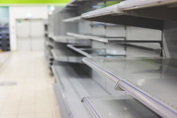 View of empty supermarket shelves, grocery store work stoppage closes, sanctions and embargo, panic...