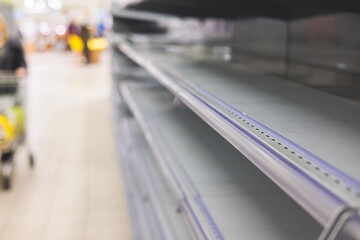 View of empty supermarket shelves, grocery store work stoppage closes, sanctions and embargo, panic...