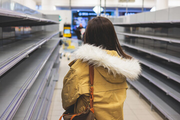View of empty supermarket shelves, grocery store work stoppage closes, sanctions and embargo, panic...