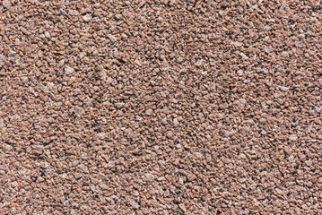 Pink gravel texture of a slab from above. High quality background.