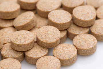Supplement round tablets (skin color)