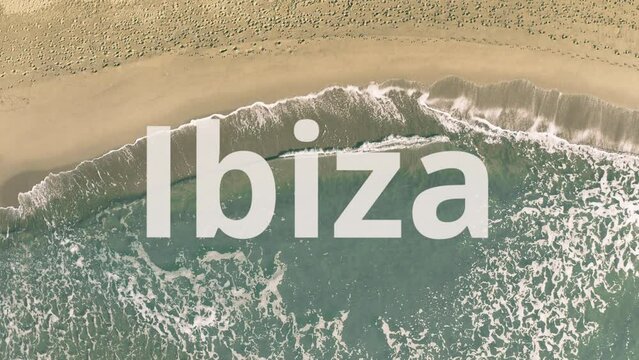 Ibiza text revealed with the shadow of a flying commercial plane on the beach, aerial top-down view