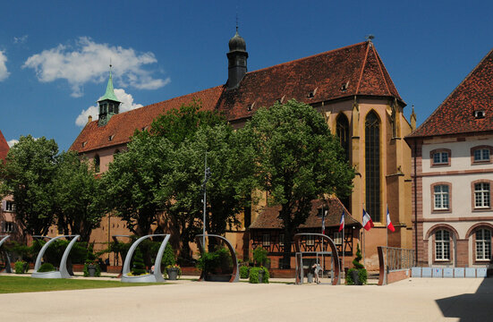 Church St. Matthieu At Place Du 2 Fevrier In Colmar Alsace France On A Beautiful Sunny Spring Day With A Clear Blue Sky