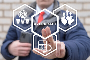Overdraft Bookkeeping Finance Business Concept. Businessman using virtual touchscreen presses...