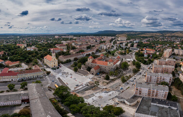 Fototapeta na wymiar Aerial view of medieval town center of Varpalota with four tower Thury castle in the middle in Hungary