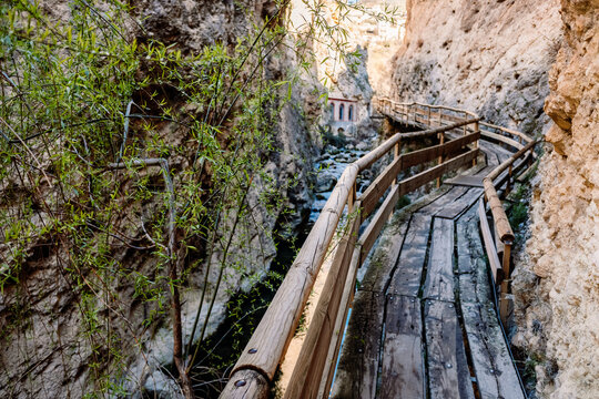 Wooden footbridge over a river in Castril, Andalusia.