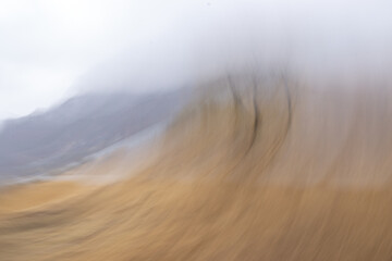 Panoramic photos of fields and mountains created with intentional camera movement, icm photos