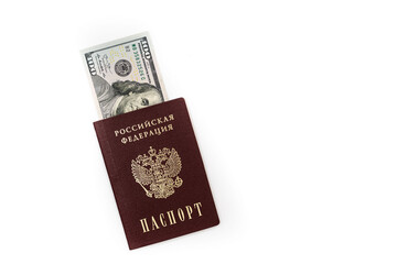 American dollars, 100 dollar bills lie in the passport of the Russian Federation, close-up on a white background