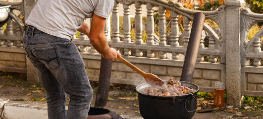 Kavurma is a Turkic sheep meat dish. Pieces of meat are stewed in a large cauldron over an open...