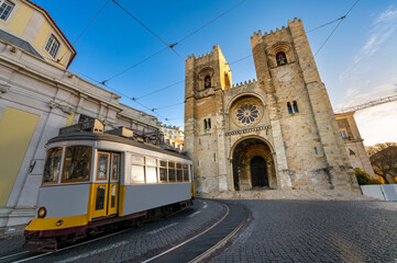 Naklejka na ściany i meble Lisbon city old town with famous Santa Maria cathedral on a sunny summer day. Portugal