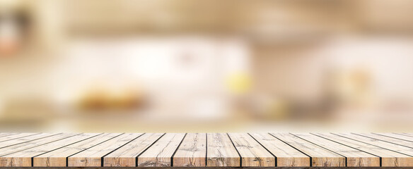 Empty wooden table and blurred kitchen background for display or montage your products
