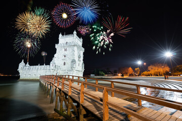 Belem Tower with fireworks. New Year's eve celebration in Lisbon, Portugal
