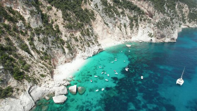 Aerial drone video of tropical paradise beach in summer in the mediterranean, Cala Gabbiani, Sardinia, Italy