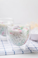 Thai dessert (Lod Chong), Colorful rice flour jelly with coconut milk in glass and ice