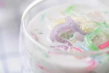 Thai dessert (Lod Chong), Colorful rice flour jelly with coconut milk in glass - obrazy, fototapety, plakaty
