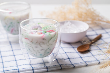 Thai dessert (Lod Chong), Colorful rice flour jelly with coconut milk in glass and ice