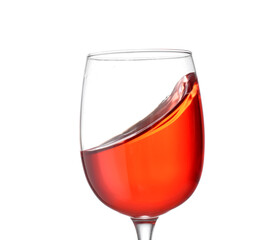 Glass of tasty wine on white background