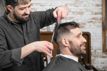 Fototapeta premium Work at the barber shop. High quality photo