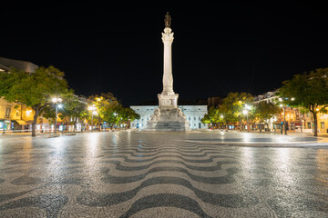 Dom Pedro IV square (also know as Rossio square) at night. Lisbon, Portugal