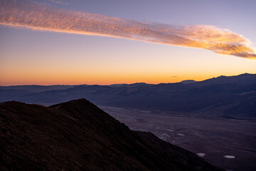 Silhouette of Dantes View  and Badwater Basin At Sunset