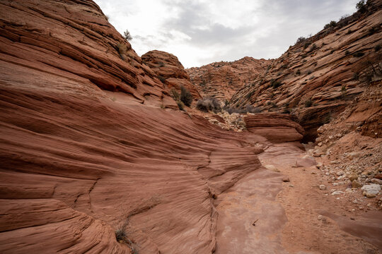 Swirling Erosion Of Rocks Leading Toward Slot Canyon © kellyvandellen