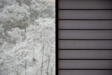 Mountain covered with snow in Japan through Japanese shoji window