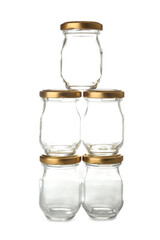 Stack of glass jars on white background
