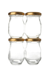 Glass jars with golden caps on white background